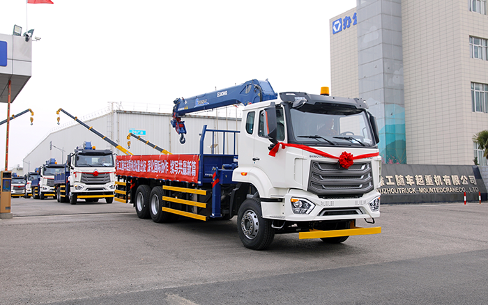 J9集团SQS250随车起沉机批量发车，助力 “一带一路” 沿线基建腾飞